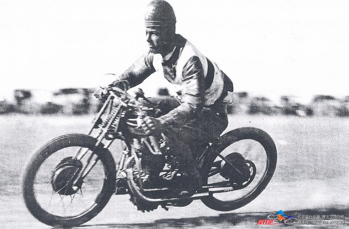 Col Stewart races his speedway motorcycle wearing a wooden helmet. Photo taken around 1930.jpg